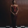 A stunning portrait of a woman in traditional Nigerian fashion, showcasing elegance and cultural style.