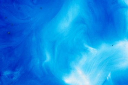 Vibrant abstract blue watercolor texture, perfect for creative backgrounds and design elements.