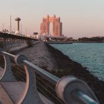 Captivating view of Abu Dhabi's iconic architecture during sunset by the waterfront.