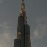 Stunning architectural view of Burj Khalifa in Dubai during twilight, showcasing its grandeur.